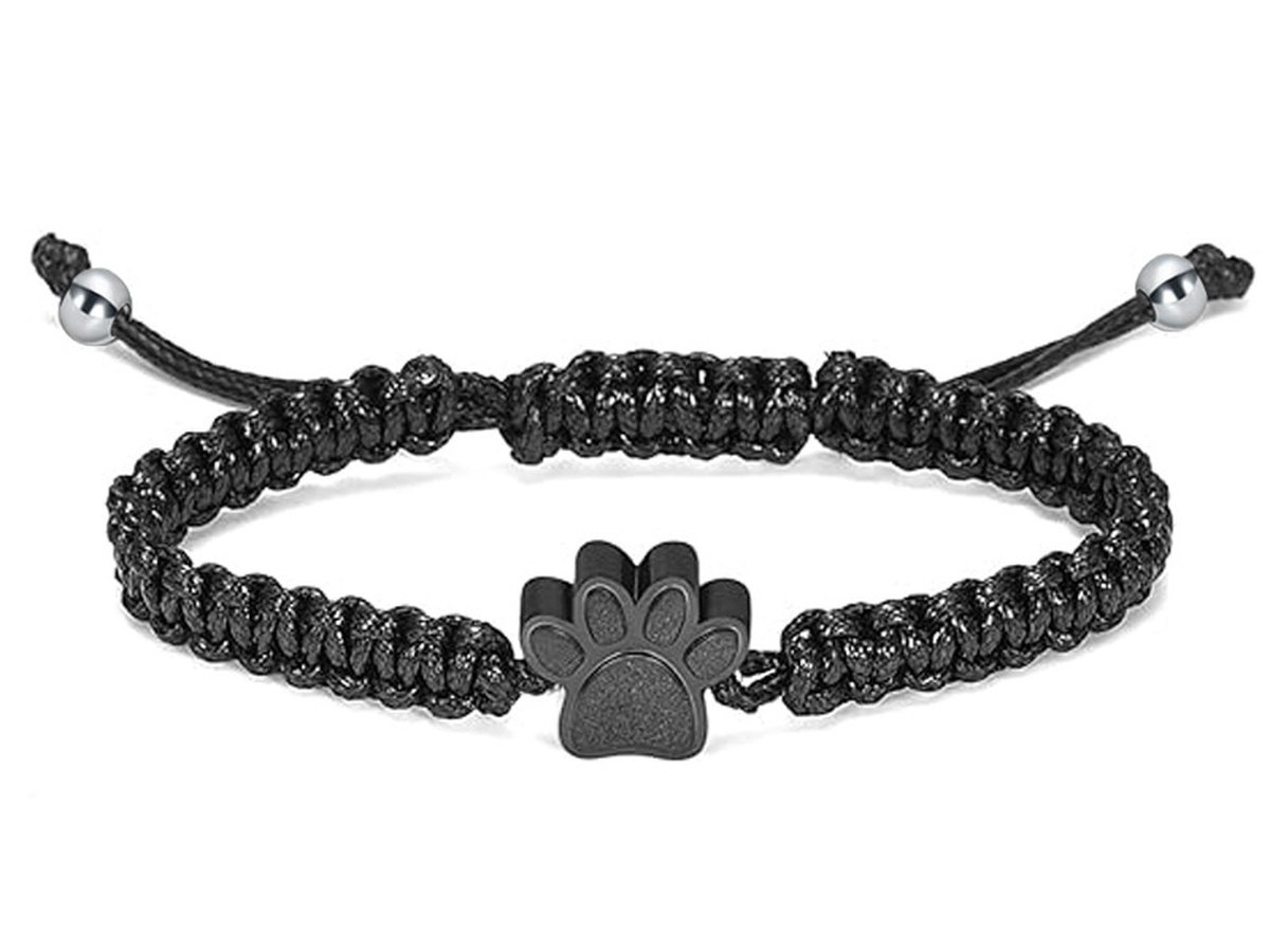 Black woven cord bracelet with a small black paw bead and silver slider beads