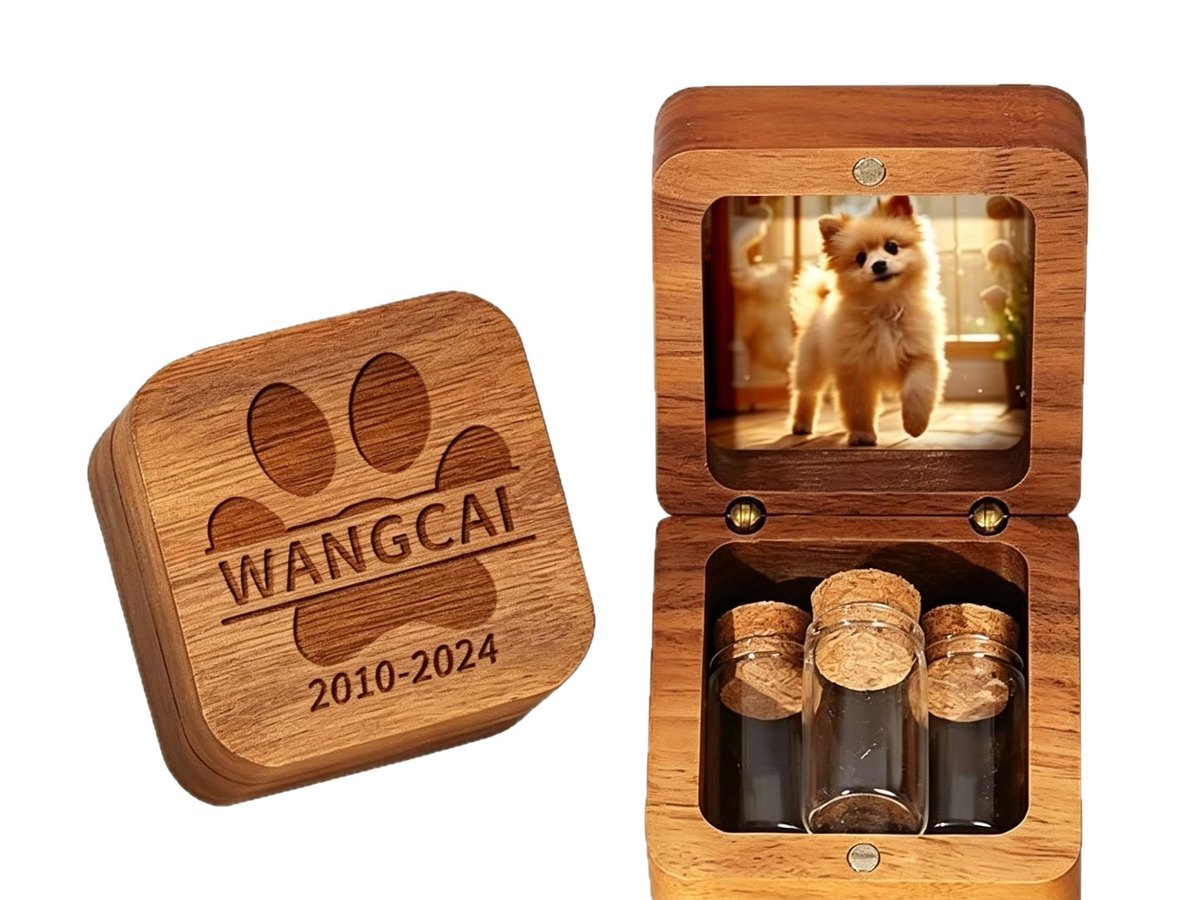 Lidded wooden keepsake box with an engraved paw print on the lid, open to show a photograph and three small glass vials