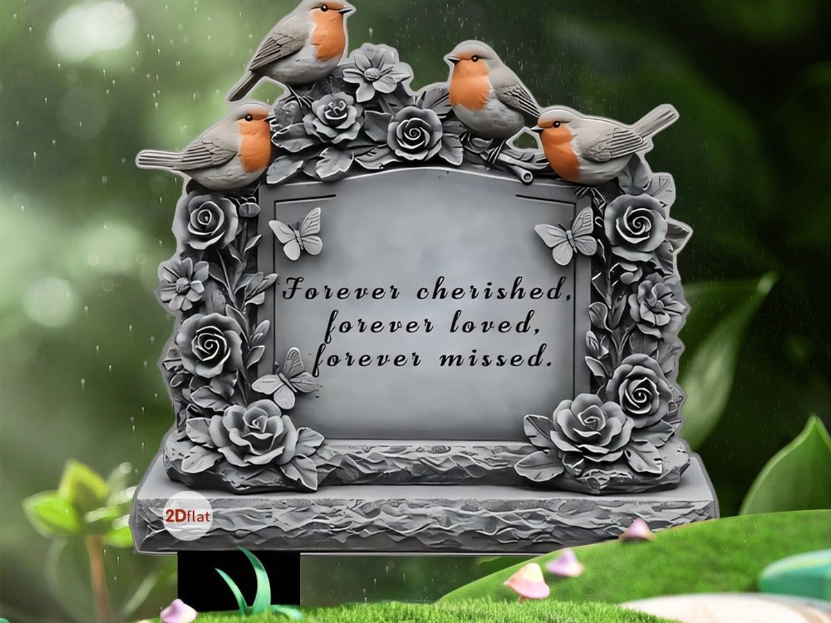 Grey memorial plaque engraved with a verse, with a robin perched on the top edge