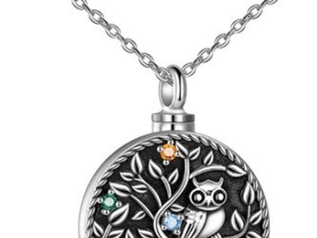 Stainless steel locket pendant engraved with a tree of life and a cat