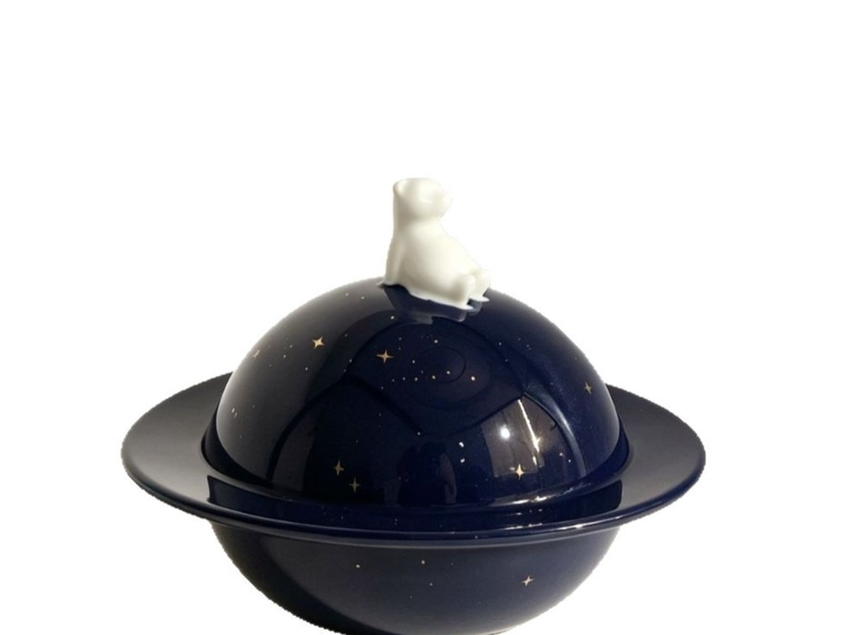 Navy blue planet shaped keepsake urn with a ring stand